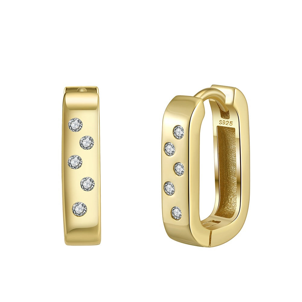 Chic gold hoops with embedded CZ