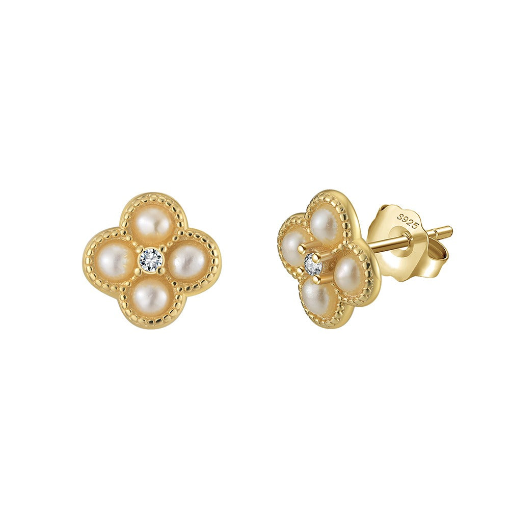Delicate  pear studs embellished with Pearls and CZ.