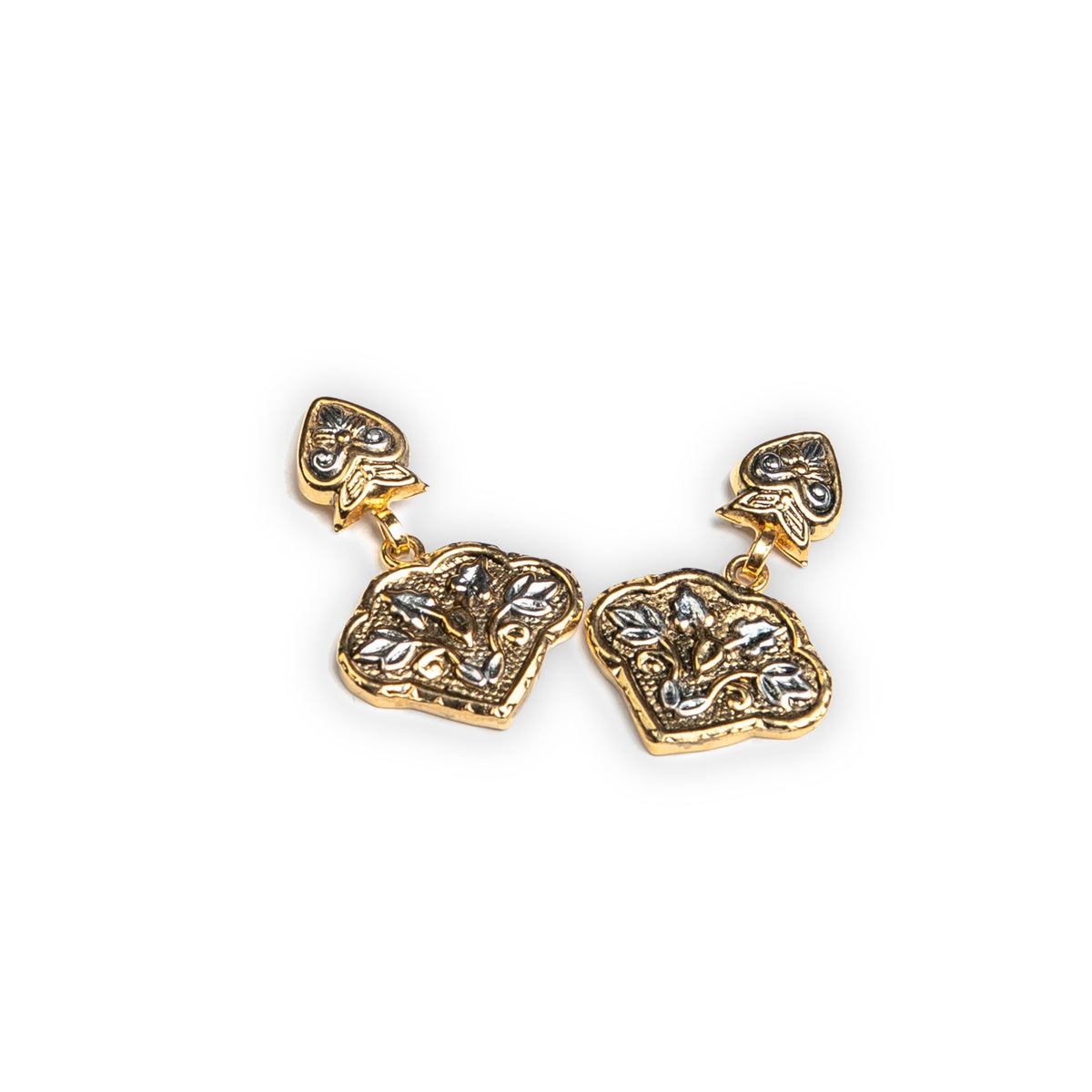 A pair of gold-toned dangle earrings with textured, organic-shaped charms and small heart-shaped studs, shown on a plain white background.